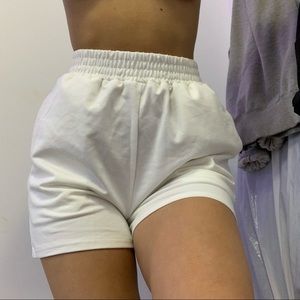 White sweat shorts